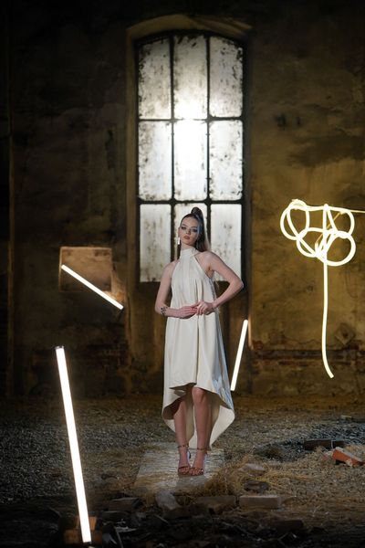 Rochie NEDELIA IVORY P – THE KINGDOM OF IVORY midi, eleganta si senzuala, asimetrica, fara maneci, din piele ecologica elastica premium, cu dantela tip plasa aurie in partea de sus a rochiei 