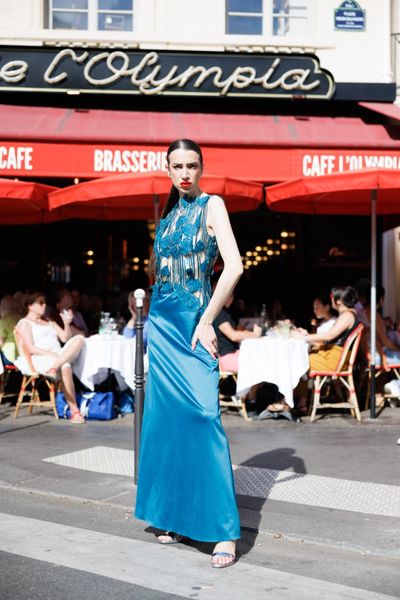 Rochie SOLARIA HOT BLUE lunga, fara maneci, in partea de sus din dantela cu flori aplicate in relief albastru petrol si cristale albastru petrol, iar in partea de jos tafta elastica albastru petrol